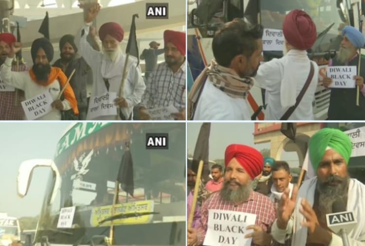Kisan Mazdoor Sanghargh Committee members put black flags and posters on passenger buses at Inter-state terminal in Amritsar