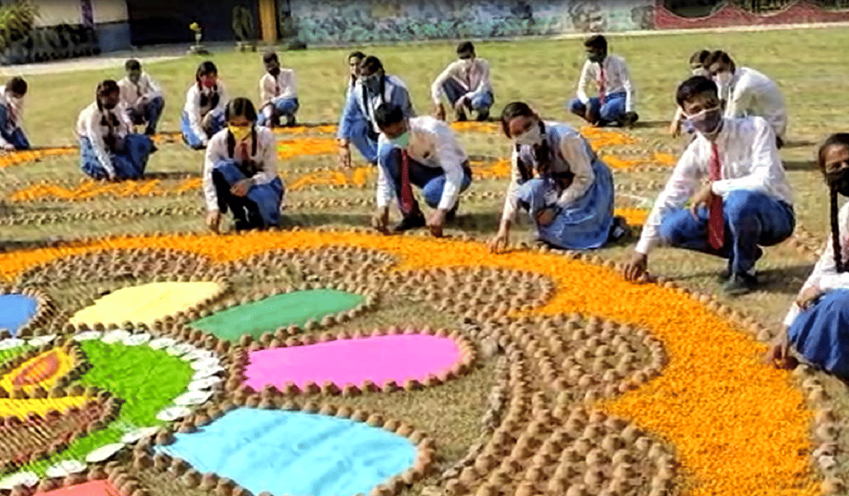 Student made Rangoli by west material given message eco friendly diwali in azamgarh
