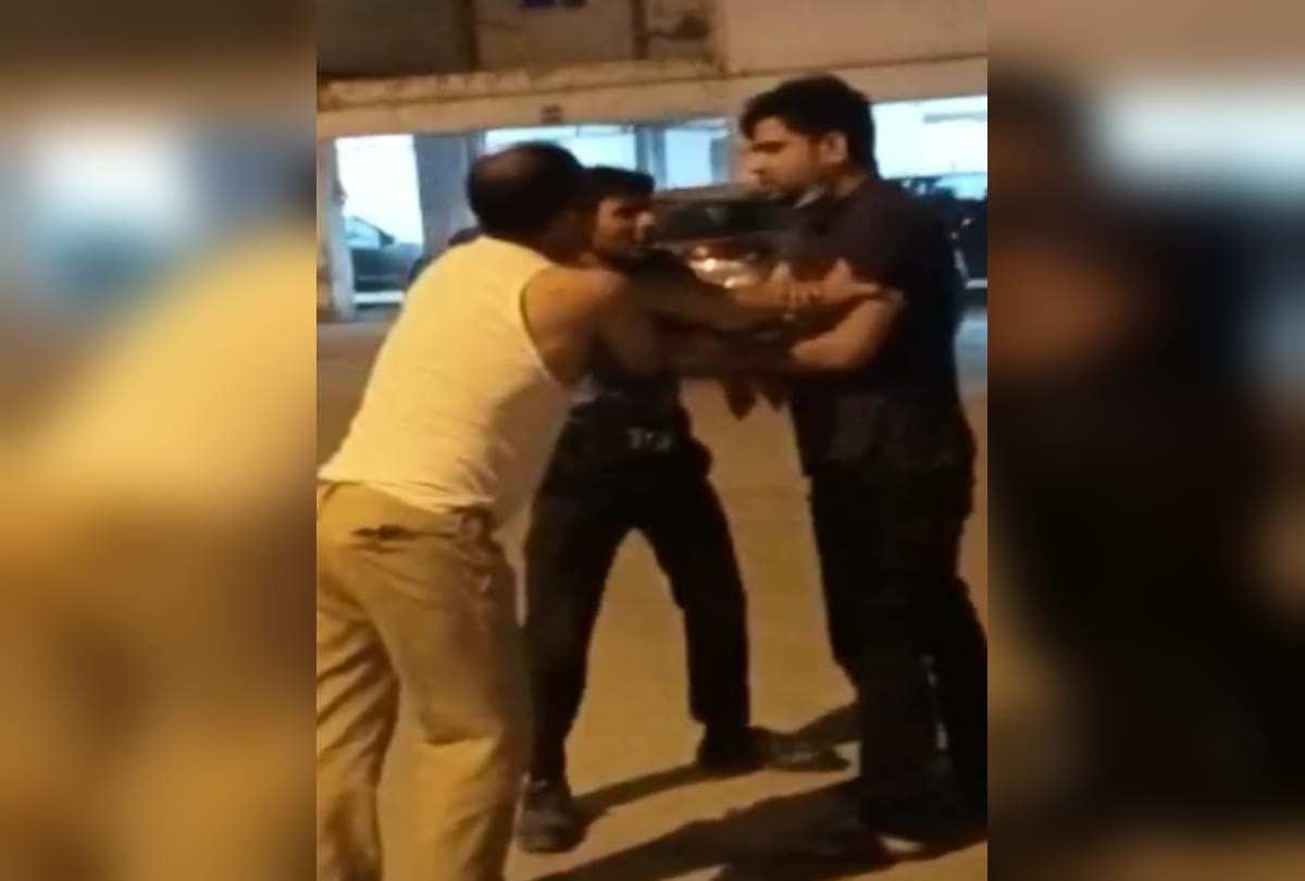 Greater noida drunk police inspector beat wife in car when society guard came to rescue he also beat him brandishes gun all update