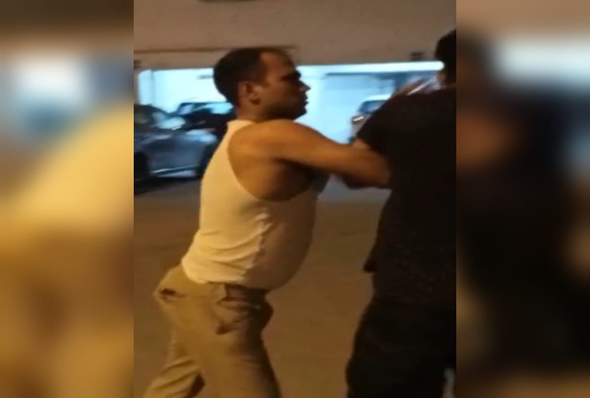Greater noida drunk police inspector beat wife in car when society guard came to rescue he also beat him brandishes gun all update