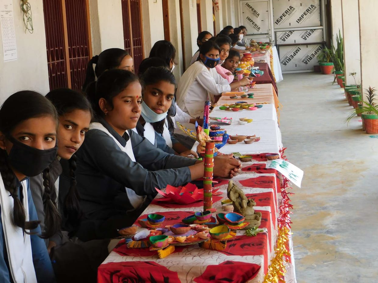 Girls made clay lamps and idols