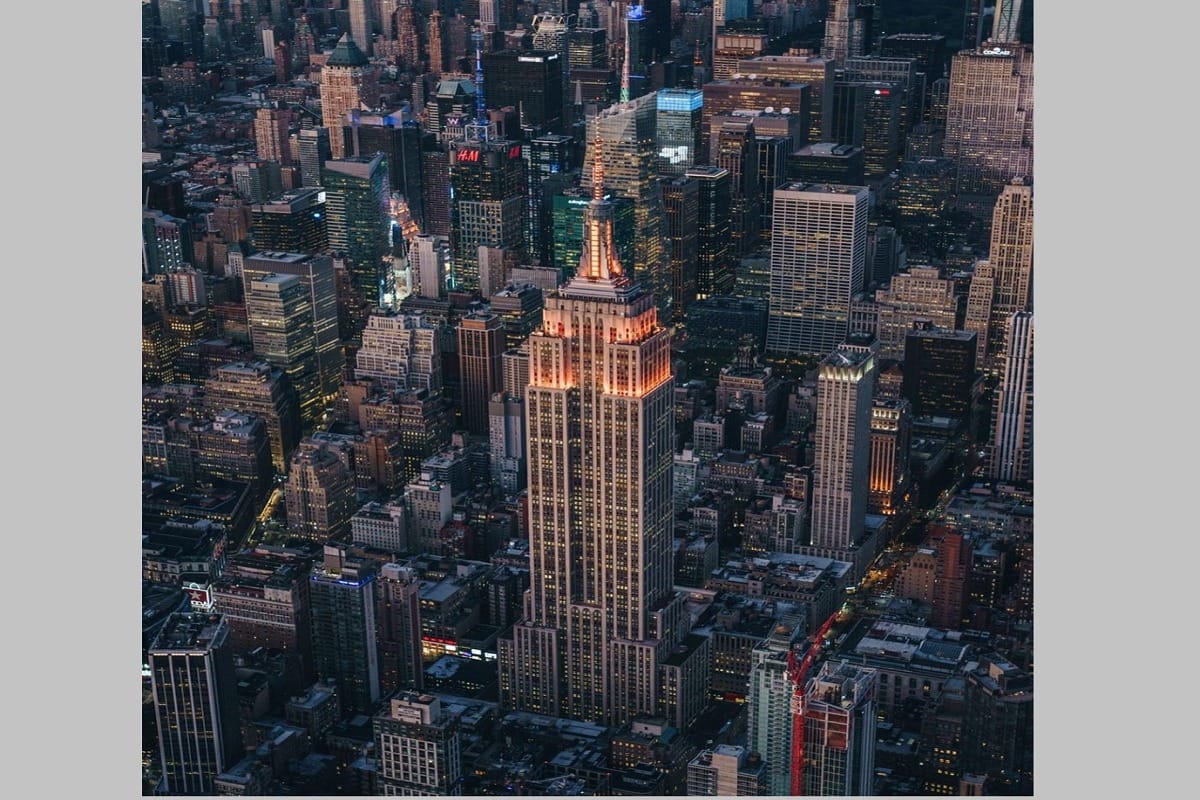 Empire state building is highlighted with orange lights in new york america on diwali