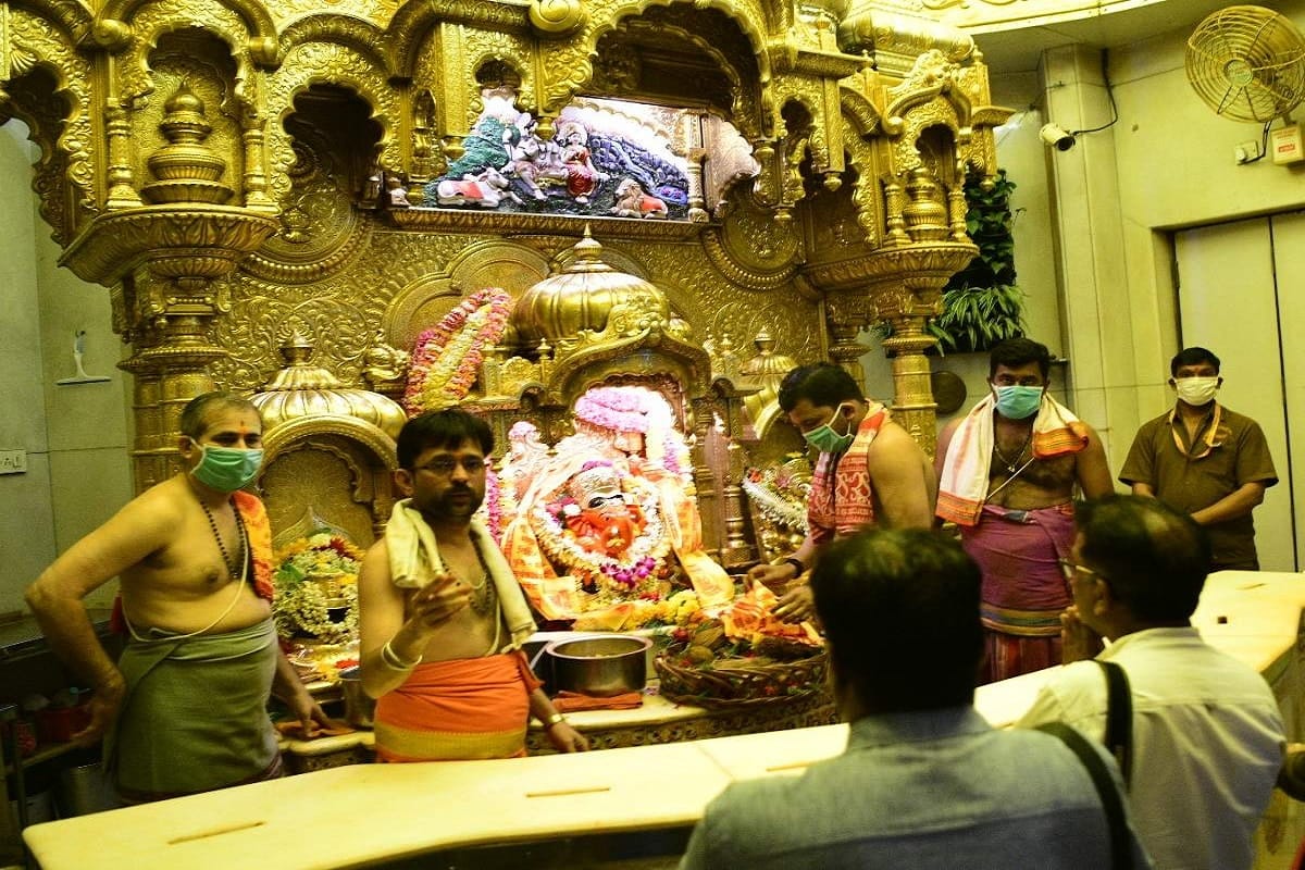 Religious places as temples churches mosques reopen in Maharashtra, 1000 devotees worship Siddhivinayak temple
