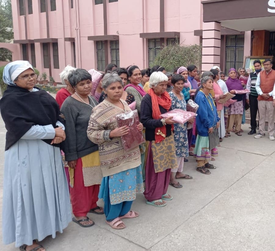 Distributed clothing and food items to destitute women
