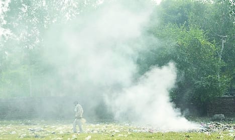 Claims wind ... streets littered with garbage, garbage burning