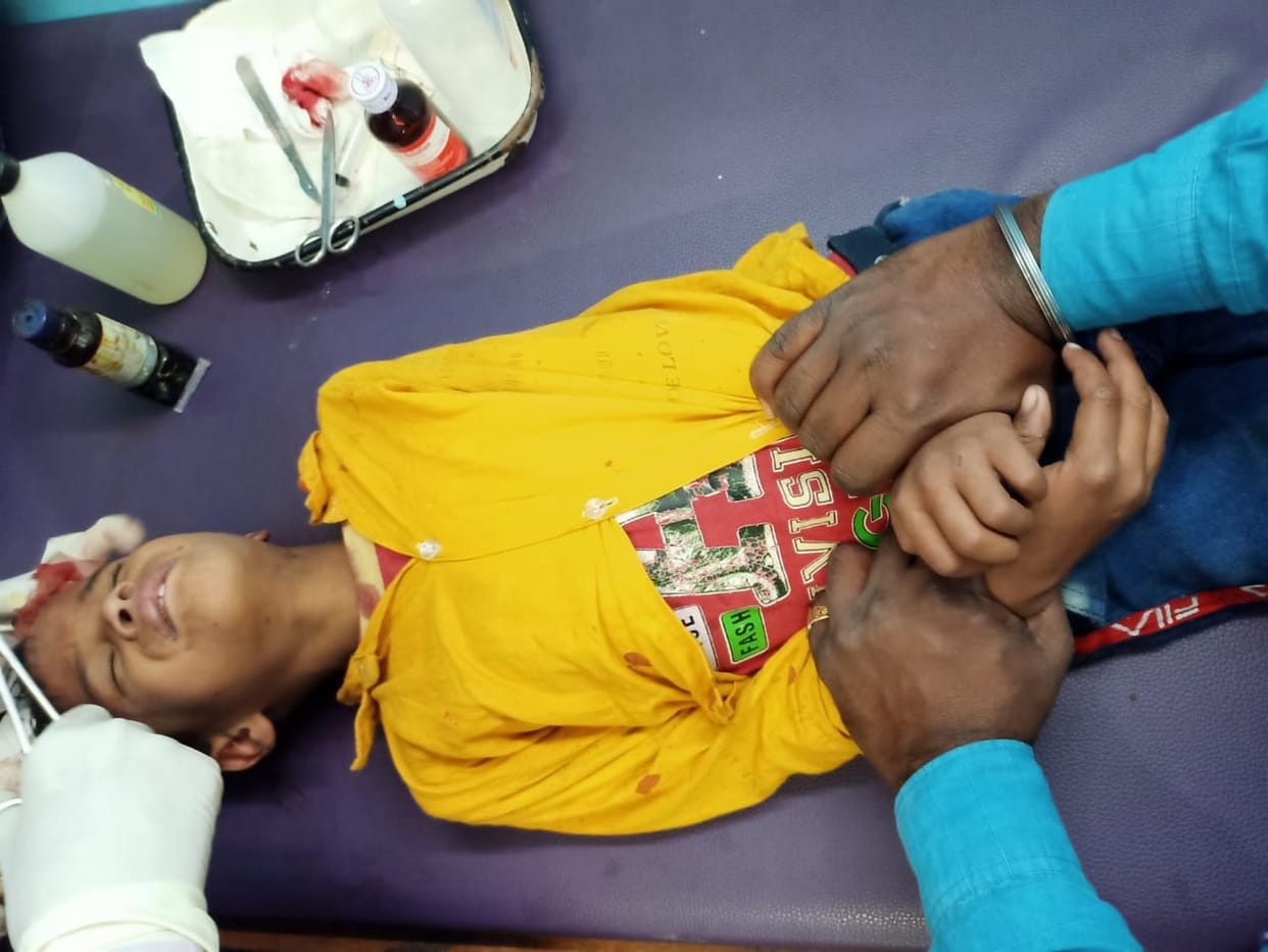 Child injured after falling from hospital gate