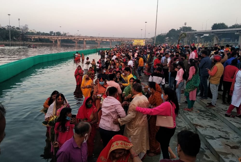 Women offer prayer on Chhath Pooja.