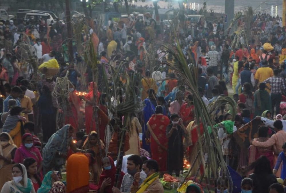 Women offer prayer on Chhath Pooja.