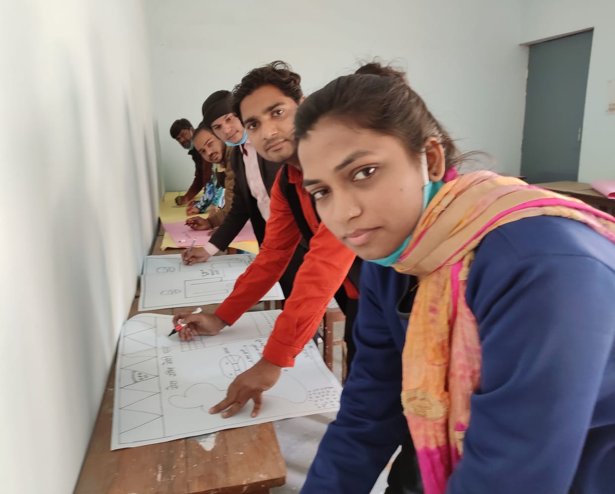Teachers showed their talent in making posters