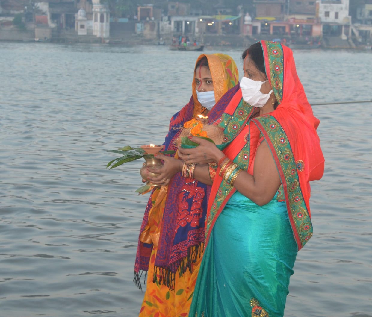 Nirjala fast opened by offering arghya to the rising sun