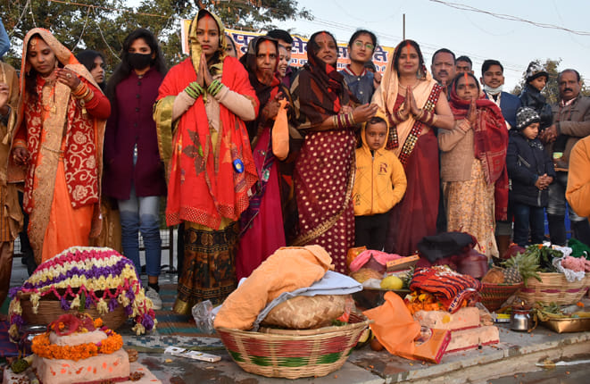 Finished Chhath Puja by offering arghya to rising sun