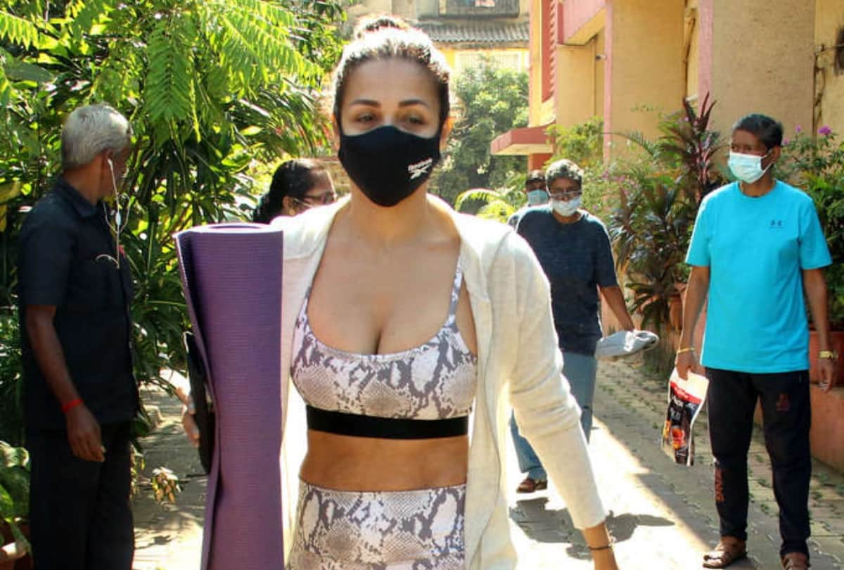 malaika arora spotted in silver grey animal print gym wear carry yoga mat