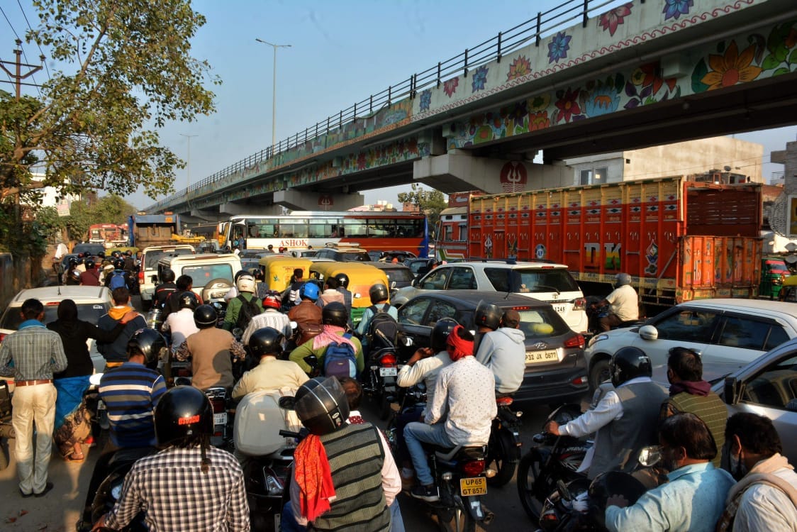 Traffic in Varanasi vehicles queued up people stuck in jam for hours