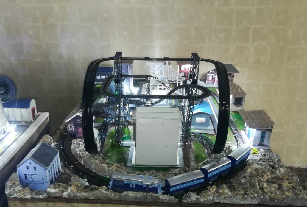 School chairman made train and dam models by Waste Material in Agra
