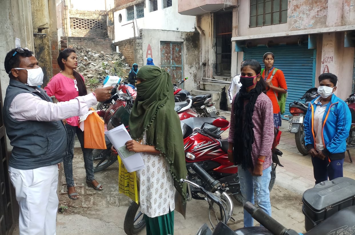 Students enter college campus after thermal screening