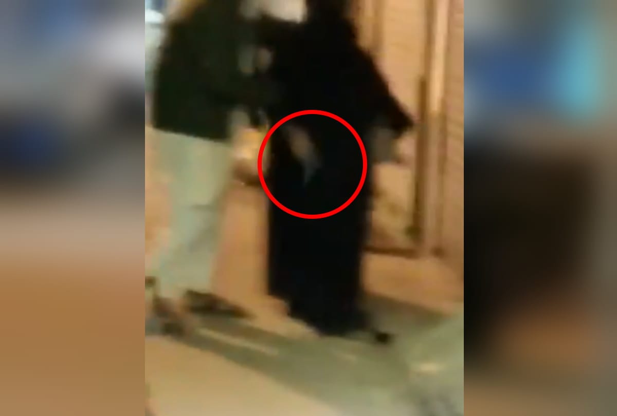 Delhi drunk burqa clad woman fire in air give abuses video goes viral on social media