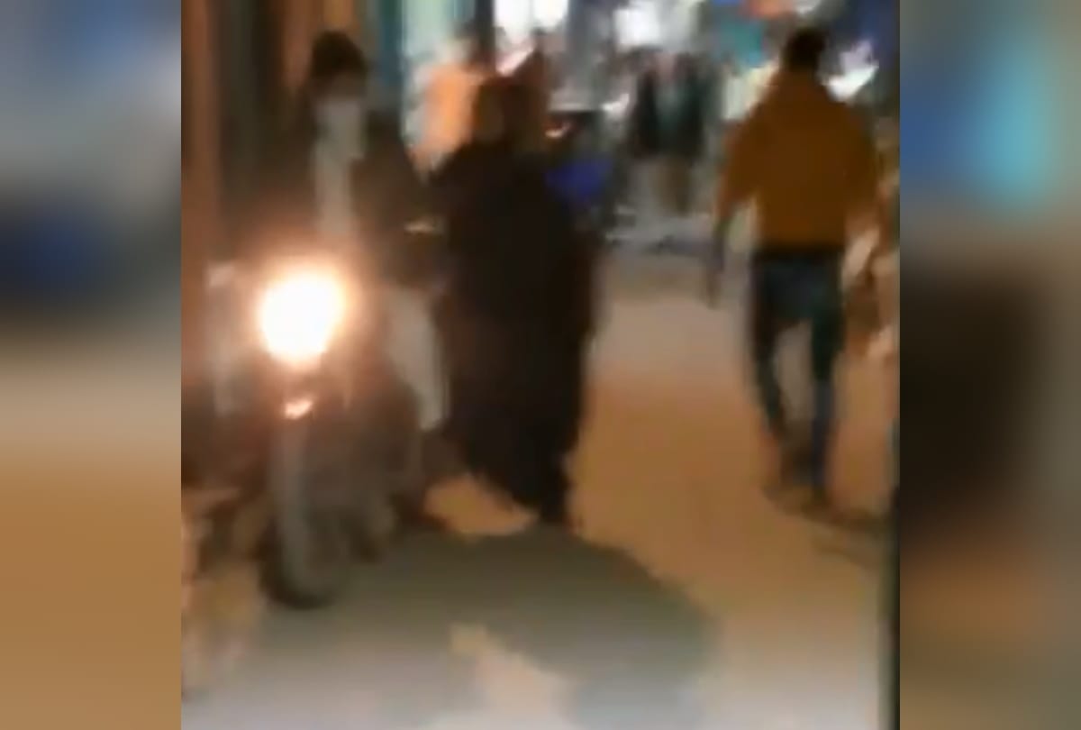 Delhi drunk burqa clad woman fire in air give abuses video goes viral on social media