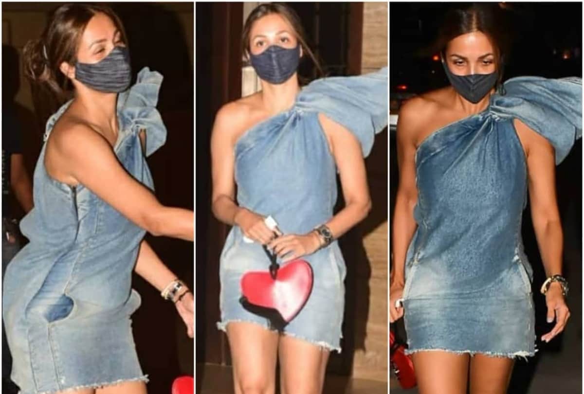 malaika arora flaunts her super toned legs in short denim one shoulder dress