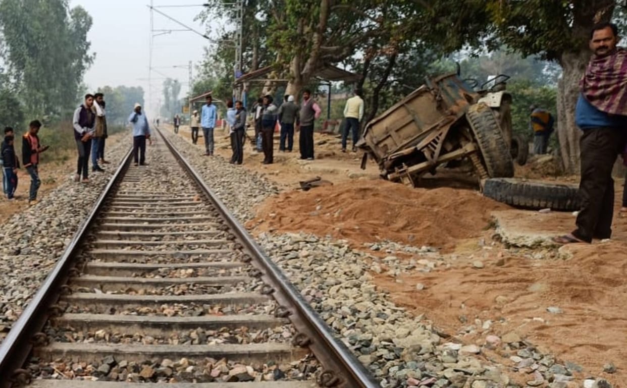 Freight train collided with tractor trolley stuck in railway track