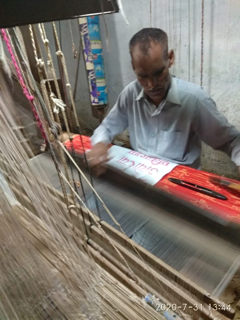Weaver Bachlal Maurya preparing special Angavastram for PM Modi