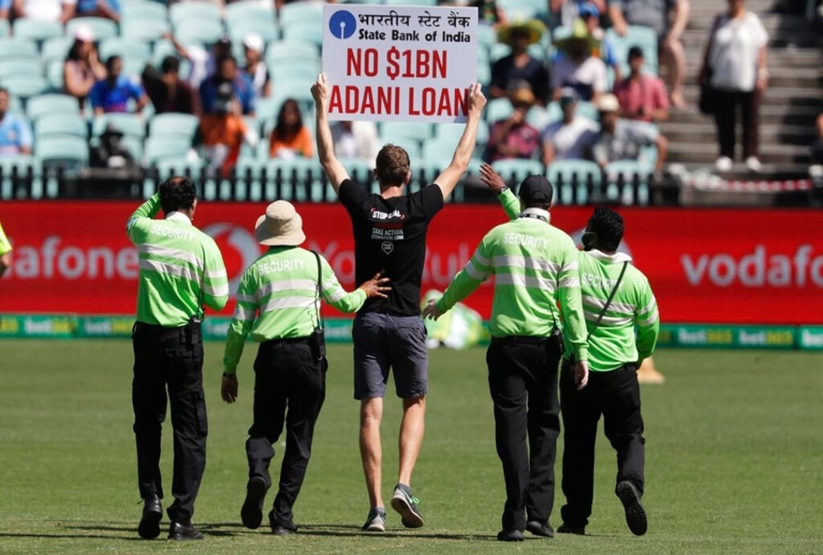 AUSTRALIA VS INDIA: Pitch Invaders into ground holding posters against Adani during Sydney ODI