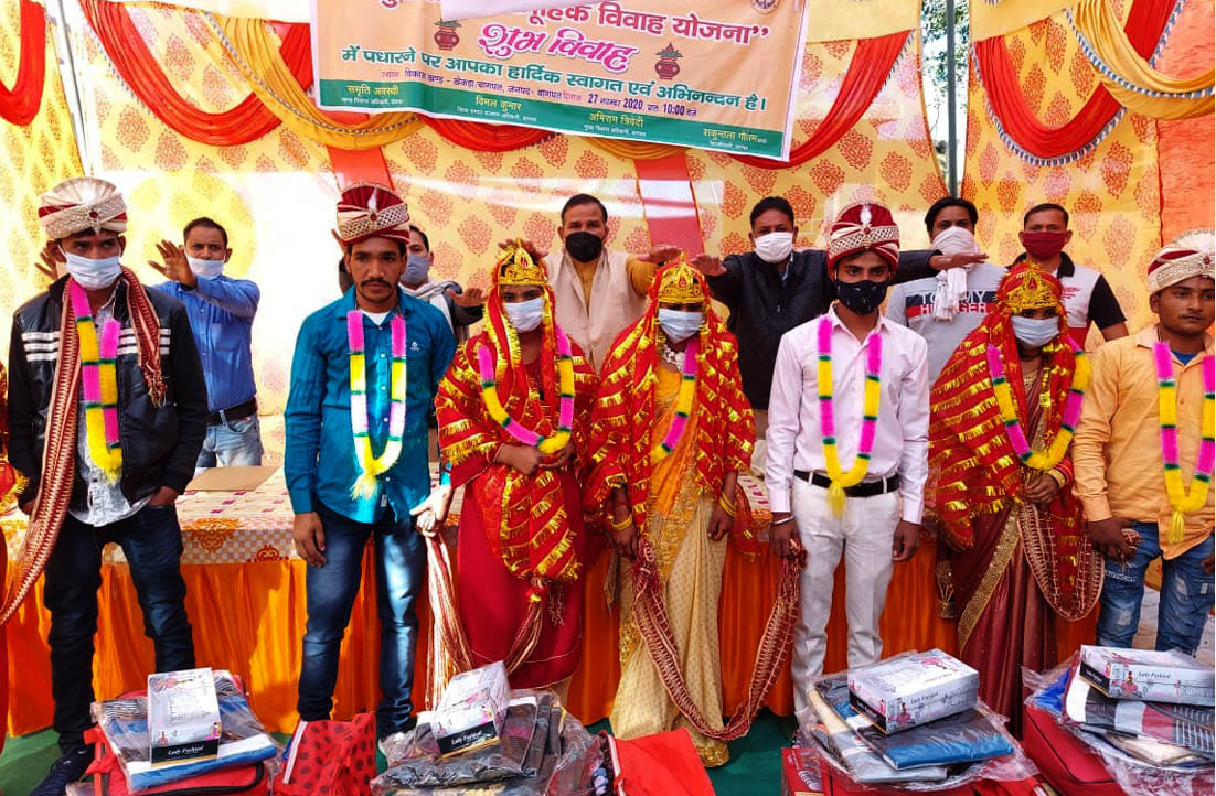 57 couples tied in marital bond