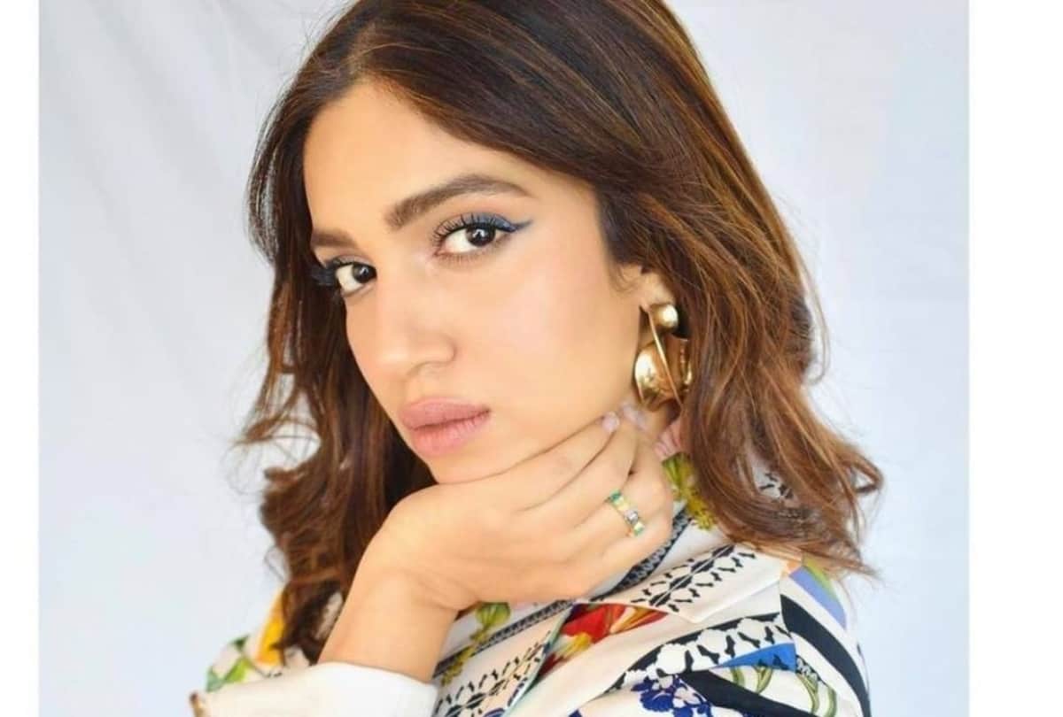 bhumi pednekar movie promotion with extra stylish look in printed coat paint and thigh high slit black skirt with corset
