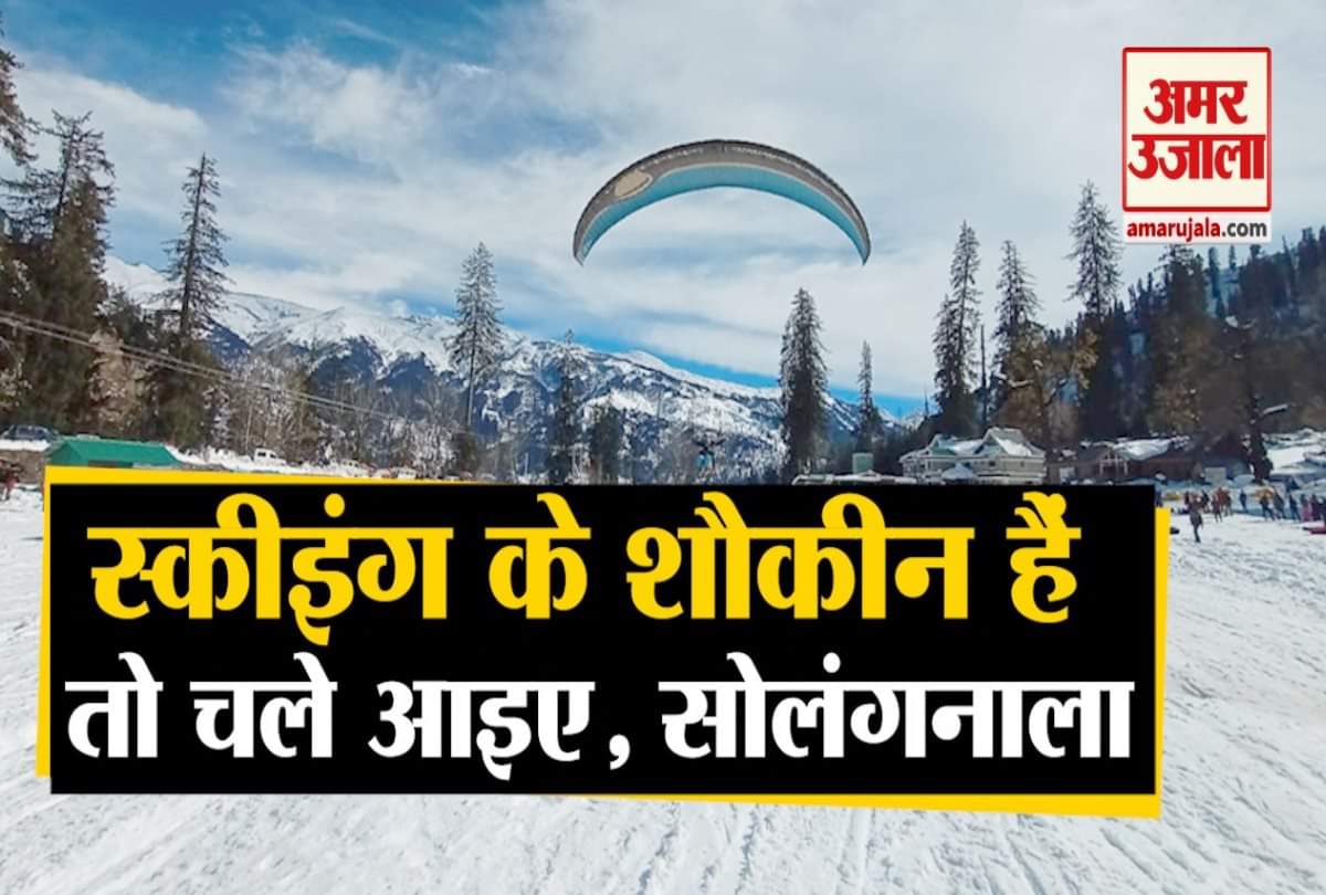 Tourists enjoy Skiing paragliding and Snow Scooter ride in SolangNala