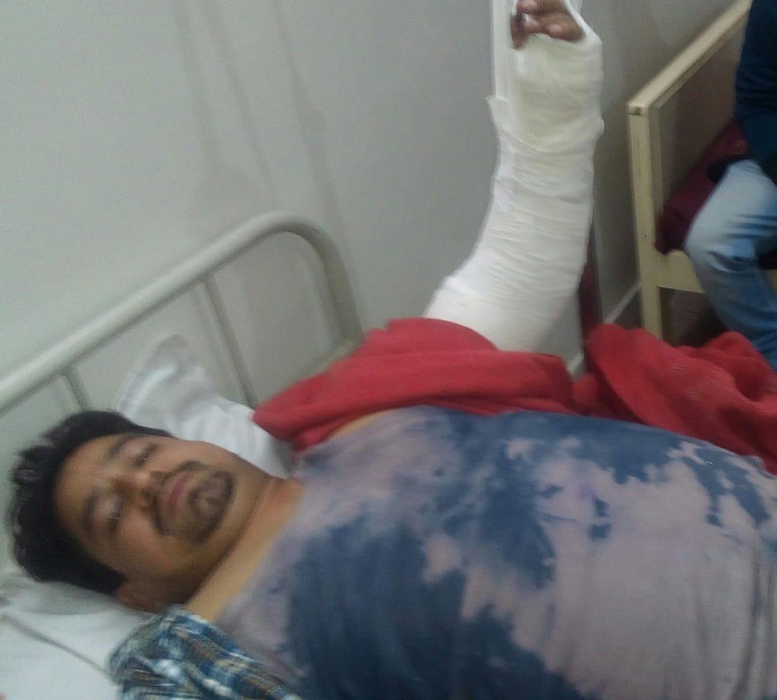 Husband injured by beating men with sticks and baton