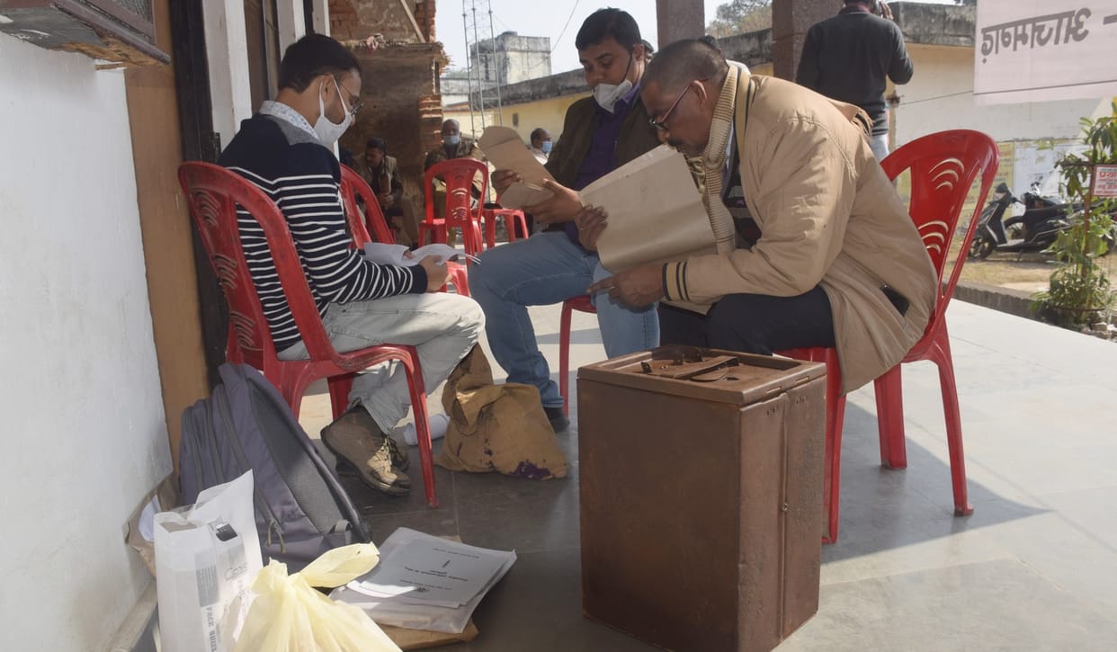 Polling parties reached booths with bags and ballot boxes