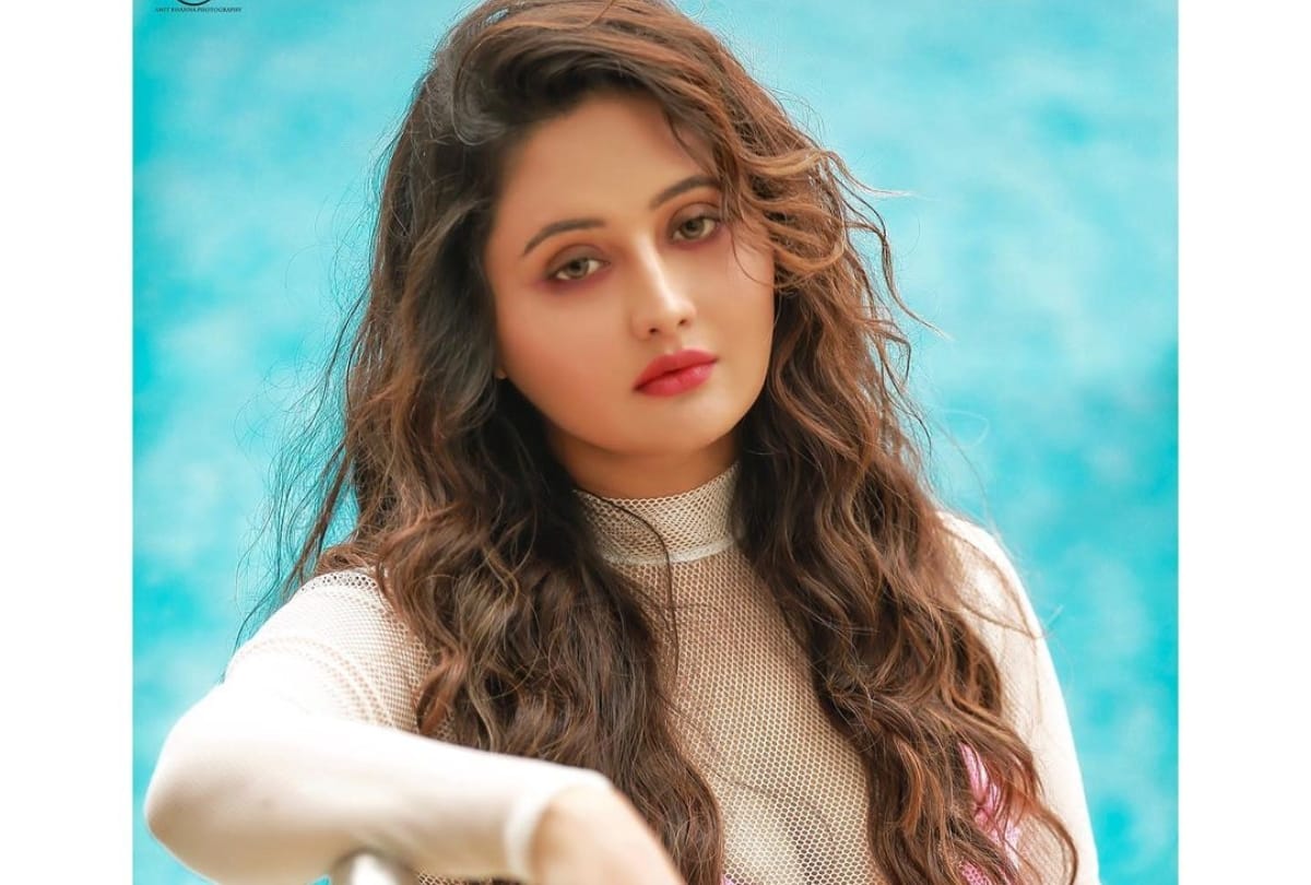 rashami desai photoshoot in swimming pool in pink bikini