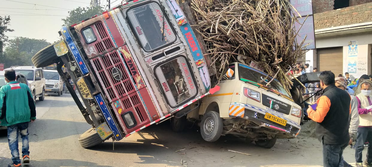 Sugarcane-laden trucks overturn vehicles, causing chaos