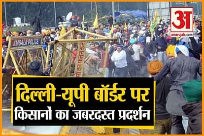 Farmer Protest: farmers use a tractor to remove barricading during Protest at Delhi-UP border