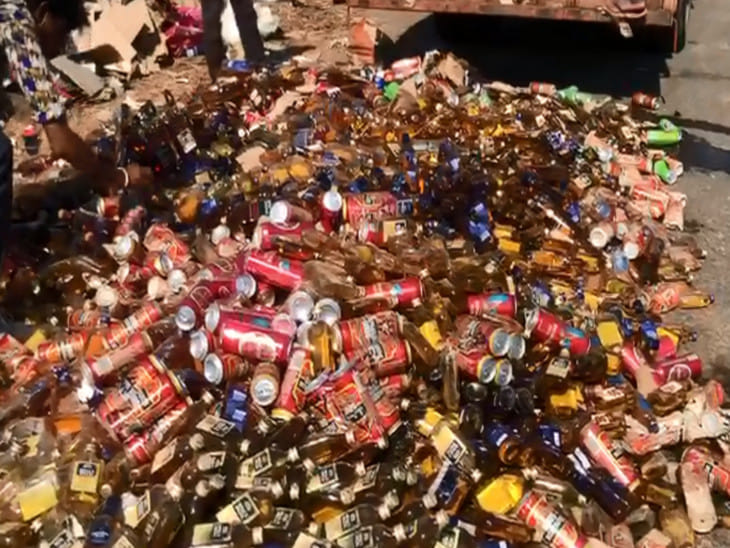 Police Bulldozer On Illegal Liquor Worth Rs 1.94 Crore in Surat Gujrat