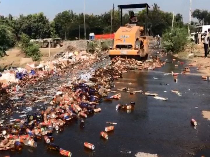 Police Bulldozer On Illegal Liquor Worth Rs 1.94 Crore in Surat Gujrat