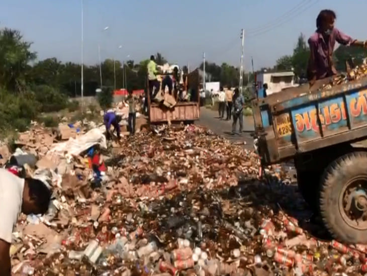 Police Bulldozer On Illegal Liquor Worth Rs 1.94 Crore in Surat Gujrat