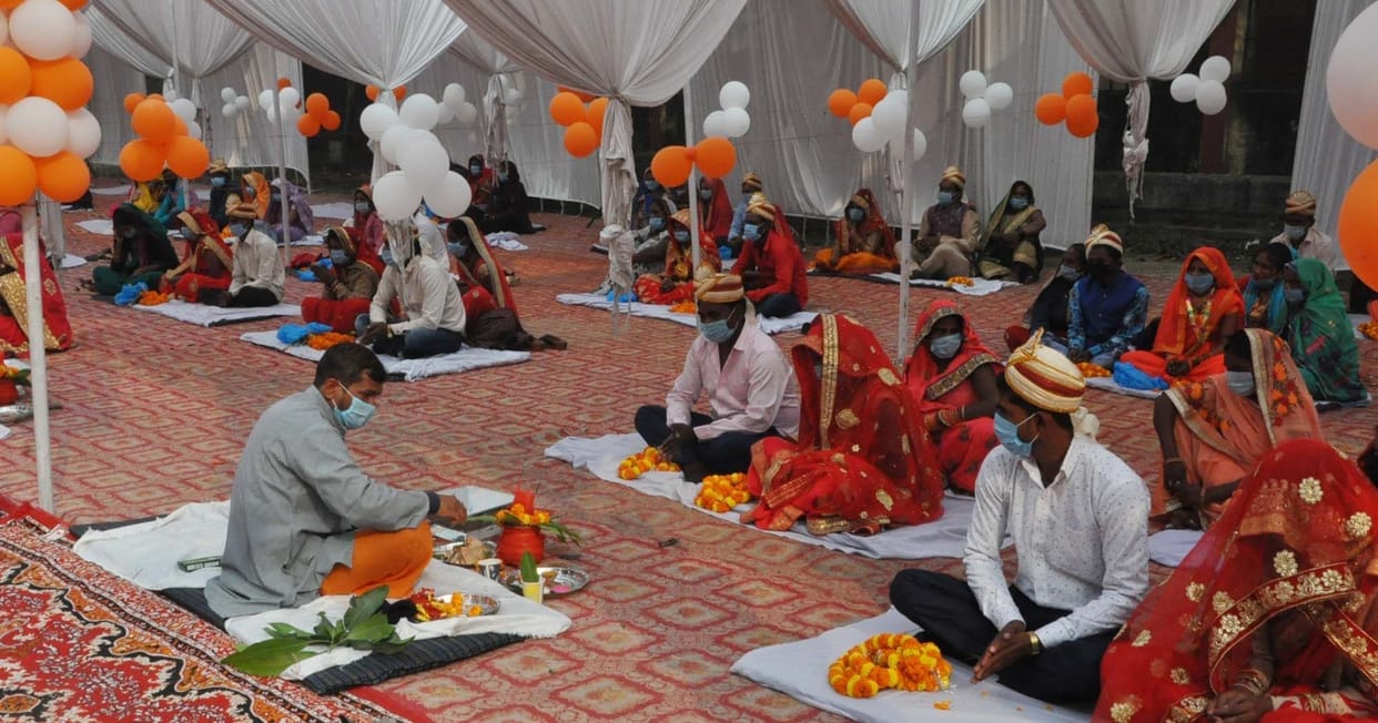 57 couples married in a community wedding