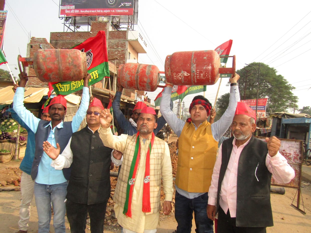SP activists protest against increased prices with cylinders