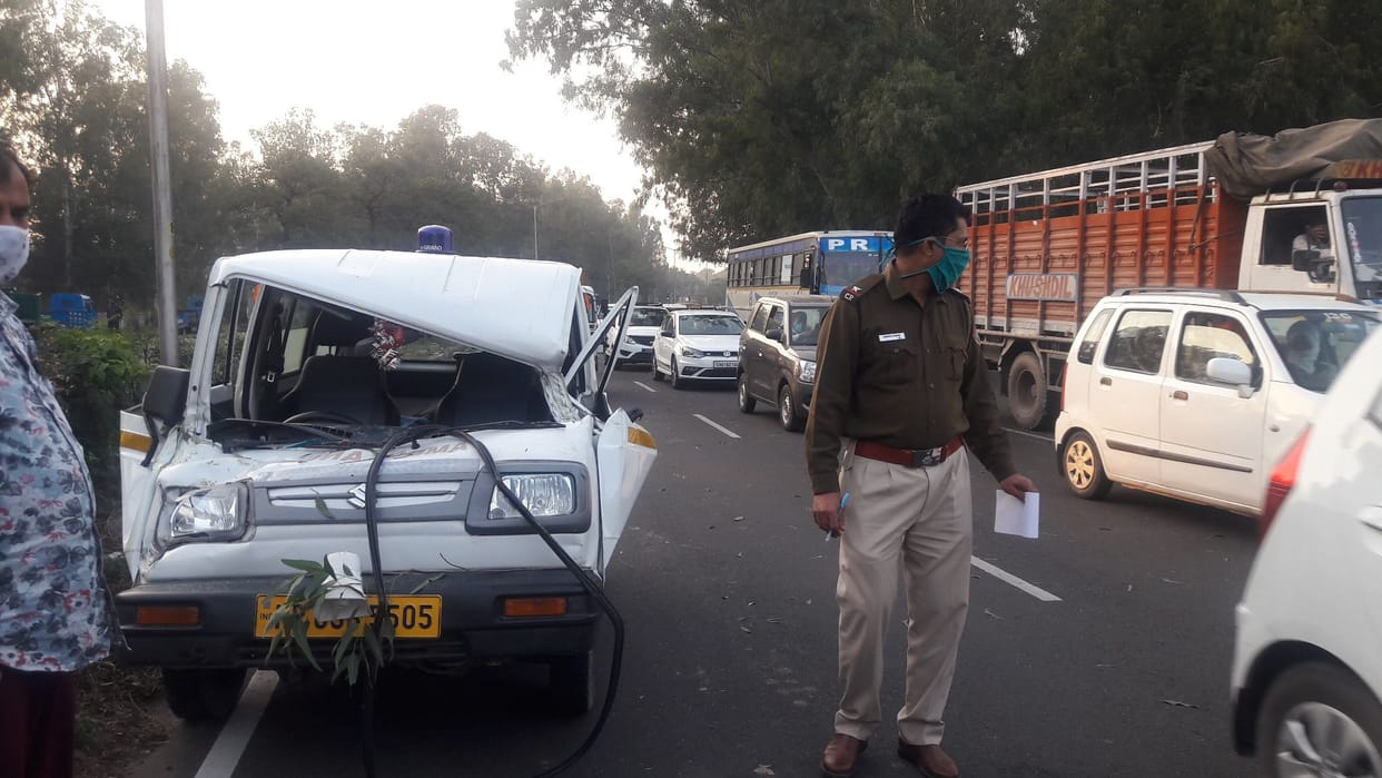 Trees fell on a moving ambulance, driver injured