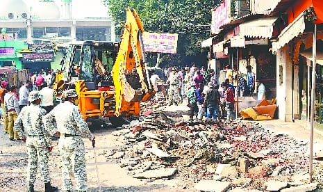 Campaign on junction road, break encroachment