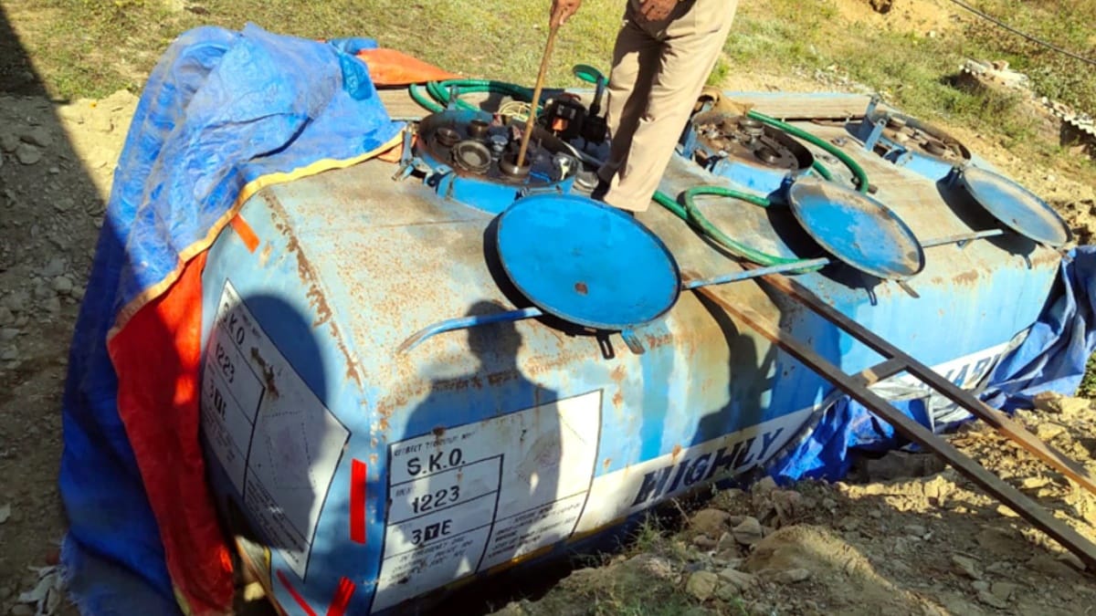 dispensing machine installed in toilet, illegal diesel pump,one arrested