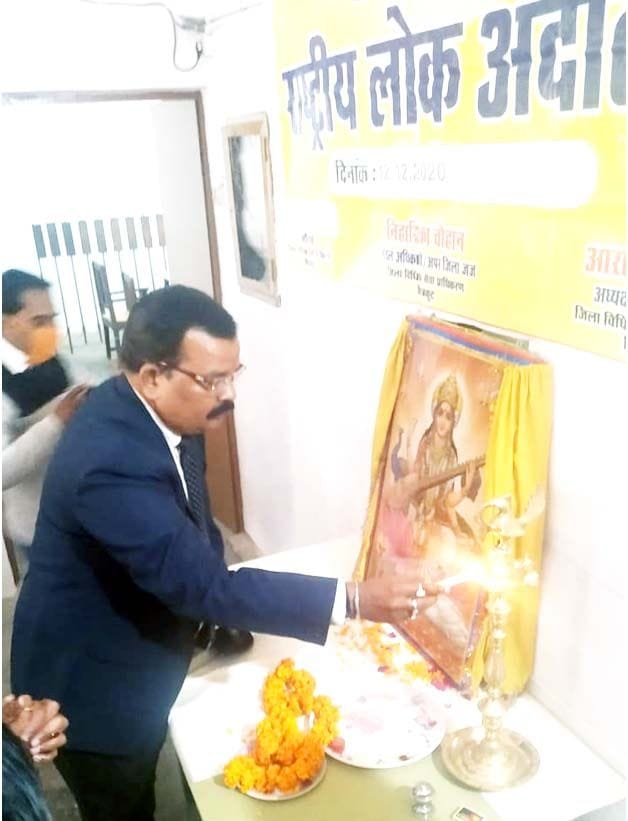 1418 cases settled in National Lok Adalat