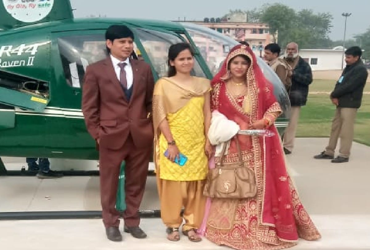 bride and groom arrived in a helicopter in the small village of agra