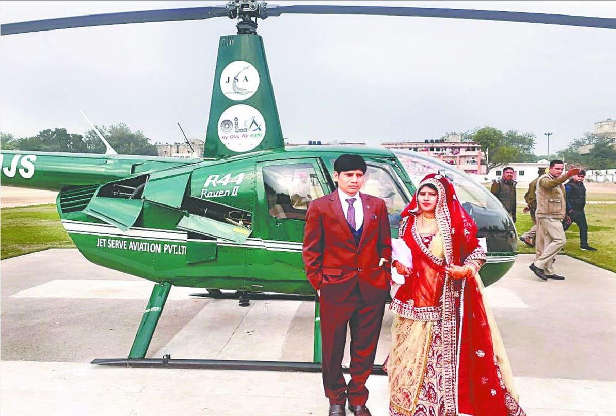 bride and groom arrived in a helicopter in the small village of agra
