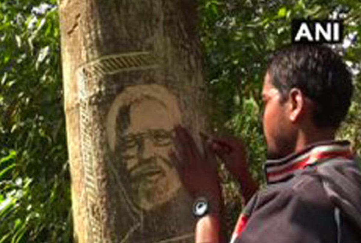 odisha artist carves portrait of PM Narendra Modi on tree