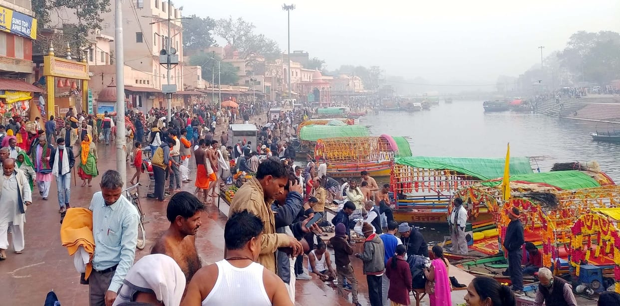 Devotees take a dip in Mandakini on Somavati Amavasya