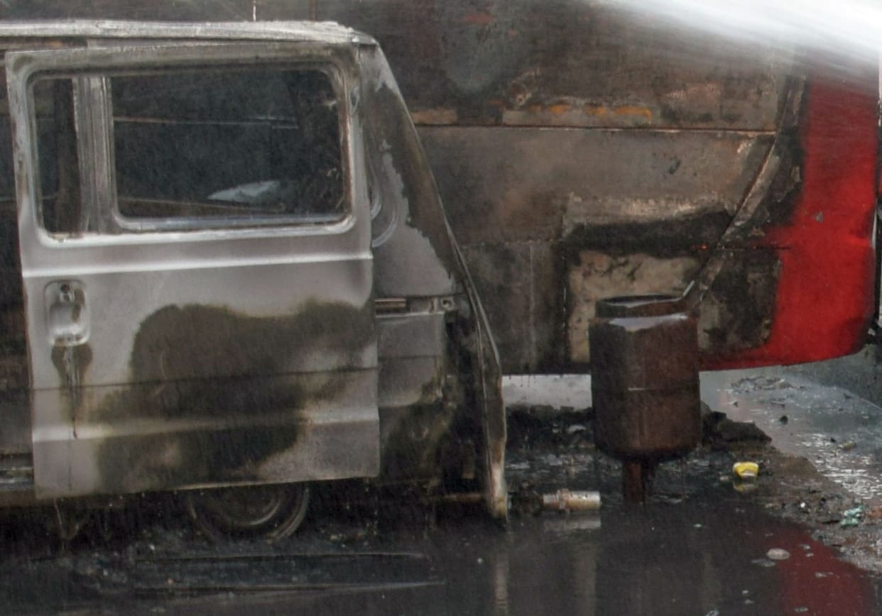 van caught fire, bus burn