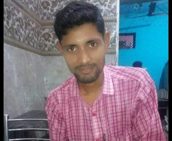 The body of a missing youth found hanging from a tree for four days