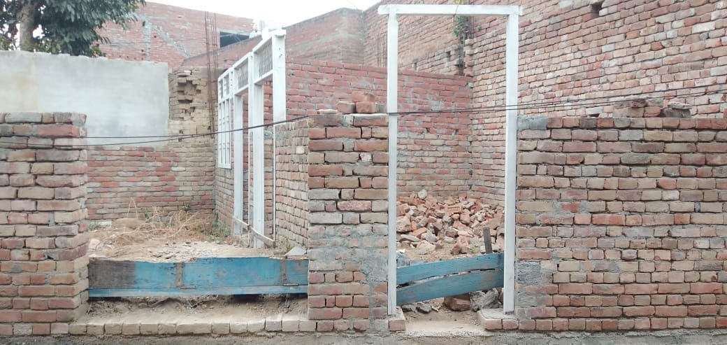 The walls of the house were built, now waiting for the roof
