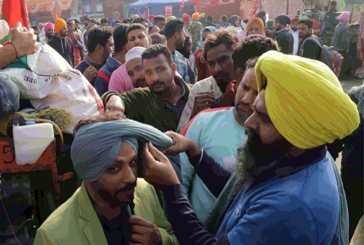 Farmers stand on demand to repeal agricultural laws on 20th day of protest